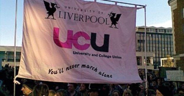 Image shows University of Liverpool UCU banner, with slogan “You’ll never march alone”